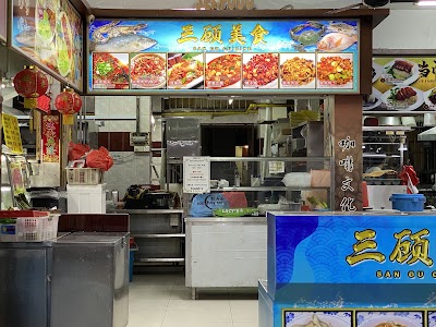 San Gu Cuisine restaurant menu board displaying seven spicy Chinese seafood dishes including fish head, boiled fish, fish soup, and mixed seafood preparations. — Items: Spicy Fish Head · Spicy Boiled Fish · Fish with Chili Sauce · Spicy Fish Soup · Spicy Mixed Seafood · Spicy Noodles with Fish · Spicy Rice with Seafood