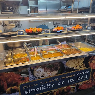 Persian Tandoor restaurant food counter displaying Chicken Shastik, Chicken Tikka, Shish Kebab, and various curries and rice dishes in heated display cases. — Items: Chicken Shastik · Chicken Tikka · Shish Kebab · Mediterranean Roast · Yellow Rice · Meat Curry · Lentil Dish