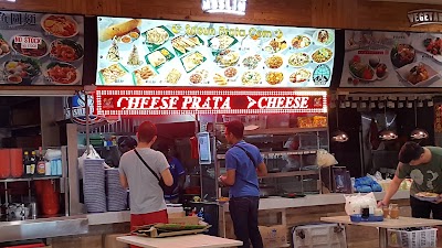 Srisun Prata.Com menu board displaying various prata items including Cheese Prata, Egg Prata, Onion, Mushroom, Spinach, Chicken, Beef, Prawn, and dessert options like Banana and Chocolate Prata. — Items: Cheese Prata · Plain Prata · Egg Prata · Onion Prata · Mushroom Prata · Spinach Prata · Mixed Vegetables Prata · Chicken Prata · Beef Prata · Prawn Prata · Banana Prata · Chocolate Prata