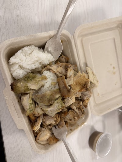 Roasted chicken with white rice served in a foam takeout container with plastic spoon from N2 No Nonsense Foods Nanyang Poly. — Items: Roasted Chicken with Rice · White Rice